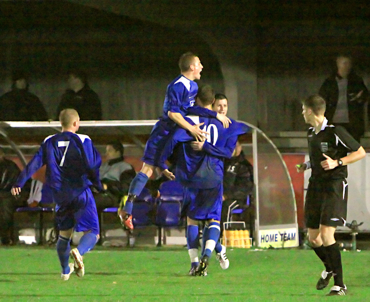 Worting celebrate Mickey Demetriou's goal
