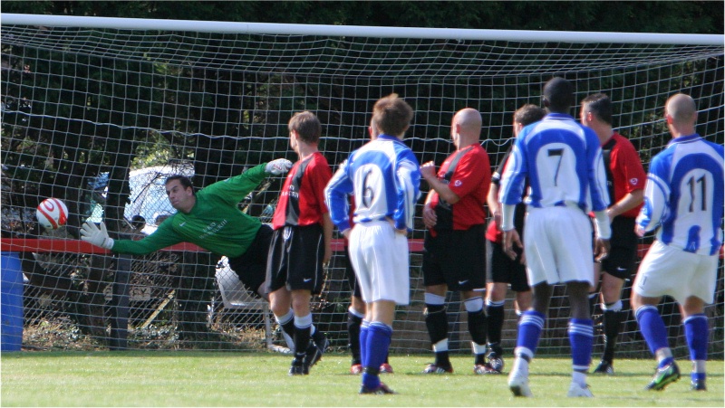 The free kick is re-taken and Ben O'Connor saves it
