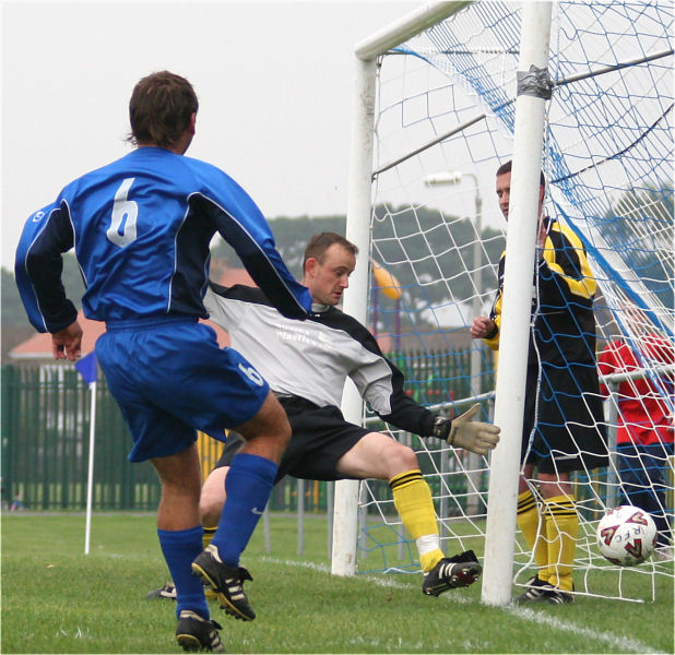 Dave Oakes puts the ball just wide
