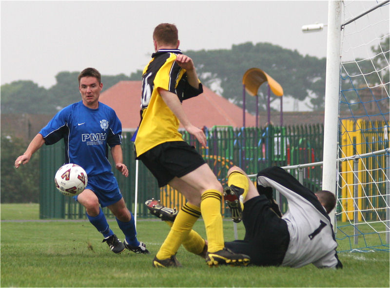 ...is well saved by the Yapton keeper Scott Austin (?) ...
