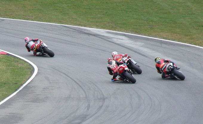The Superbikes scratching round Graham Hill bend
