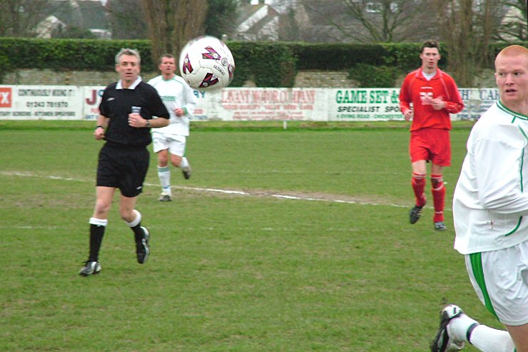 Scott Tipper sees the ball go out for a throw
