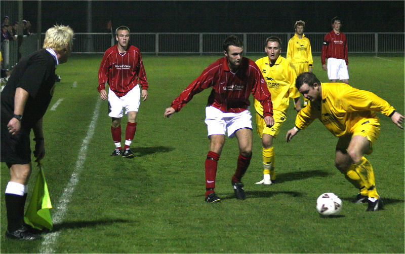 Adam Davis (?) on the ball watched by Dave Walker and Tom Ridley
