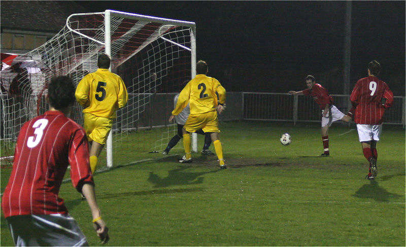 Josh Sutcliffe (3) crosses to the far post ...
