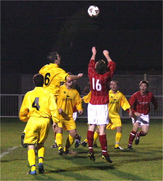 Sub Chris Couzens (16) gets in the action but cannot rescue Arundel
