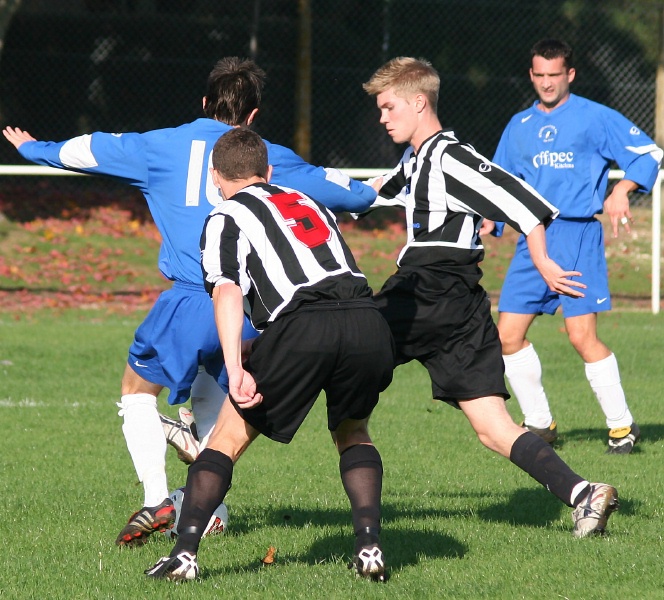 Steve Blake (10) closely watched by Andy Wilson and Sam Jeremiah
