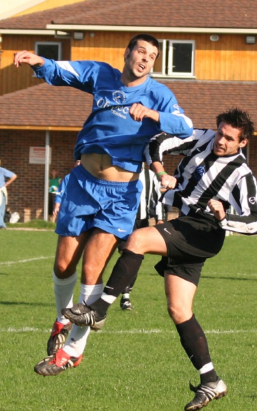 Dan Griffin heads away from Chris Maynard
