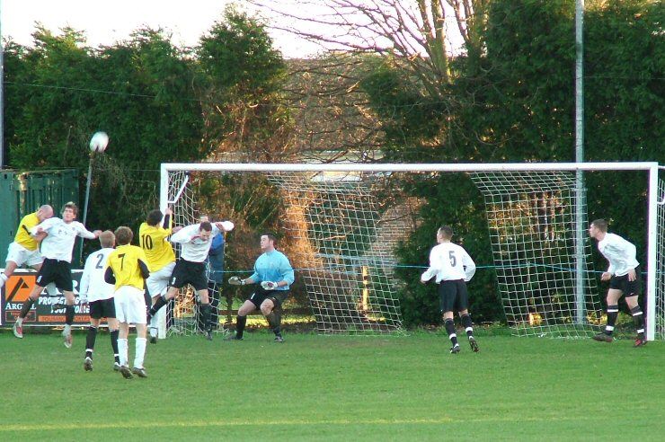 Daren Pearce (on the far left),  Grant Vanson (7) and Mark Windsor (10) create havoc in the East Preston box
