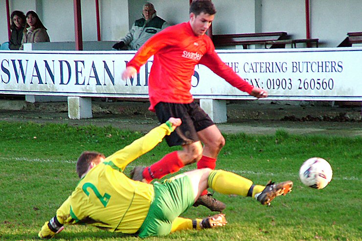 Mark Drinkwater (2) tackles Wick's Tom Manton
