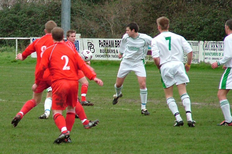 Anyones ball as it drops between Geoff Clark (8), Oliver West (2), David Wright and Alex Ward (7)

