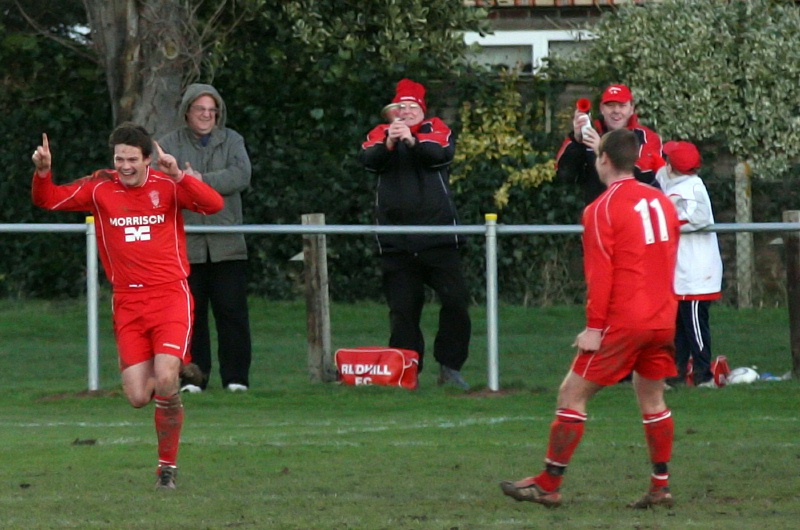 The Redhill faithfull celebrate another goal
