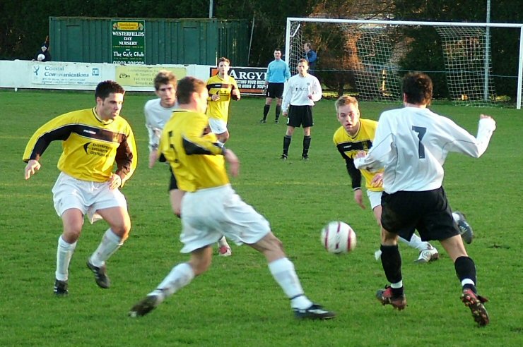 Chris Hibberd (7) about to be challenged by Mark McCallum (5)
