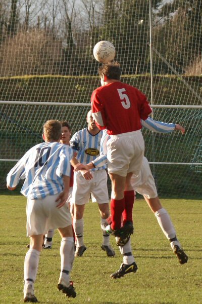 Arundel captain Barry Pidgeon heads upfield
