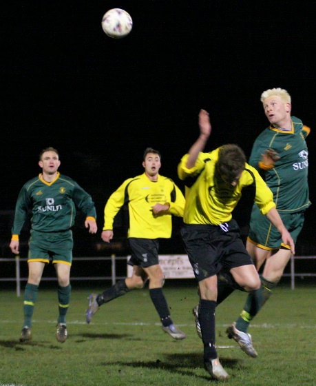 Tom Graves tries a header
