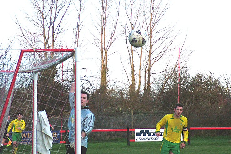 Westfield keeper Peter Newstead watches this Wick strike curl away to safety
