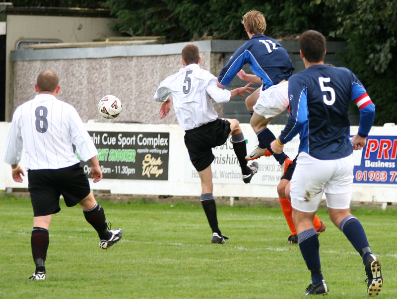 Ross Treleaven (11) jumps with Chris Hall (5)  watched by Paul Brown (8) and Craig Bishop (5)
