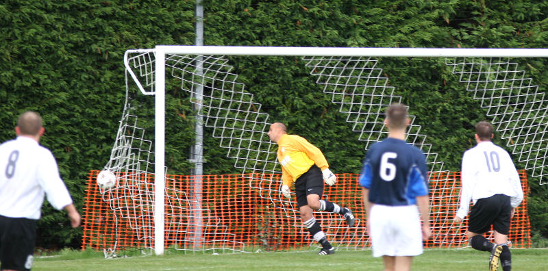Stuart Bennett (out of picture) opens the scoring with a great shot from 25 yards ...
