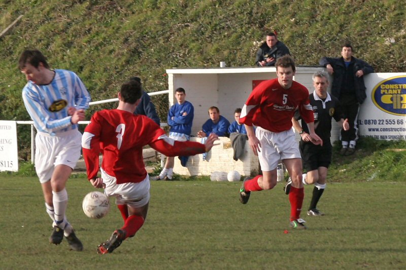 Josh Sutcliffe (3) tackles Steve Webb
