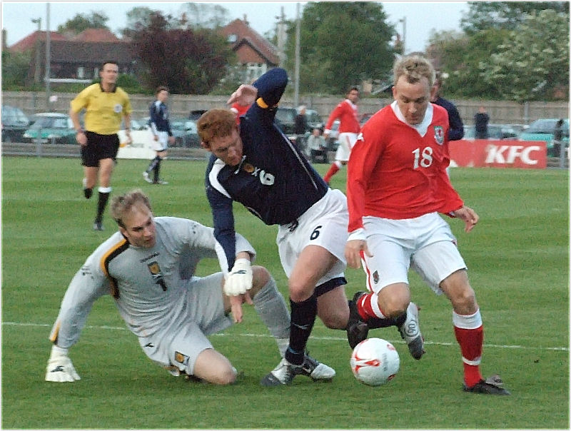 Chris Moore (18) beats the tackle to get Wales 2nd goal
