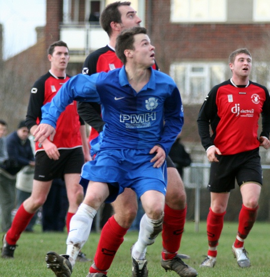 Ryan Morten looks to win the ball
