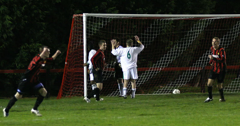 ...somehow gets through Chi's defence and Adam celebrates as Wick go one up
