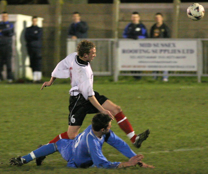 Callum Britton is tackled by Peter Proto
