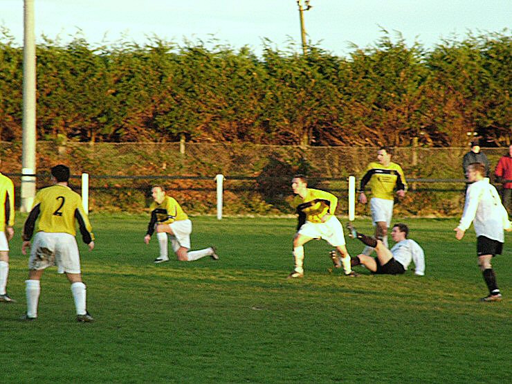 Somehow Matt Axell, on the deck, gets East Preston's winning goal
