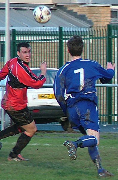 Lloyd Hatton and Ryan Morten (7) going for the ball
