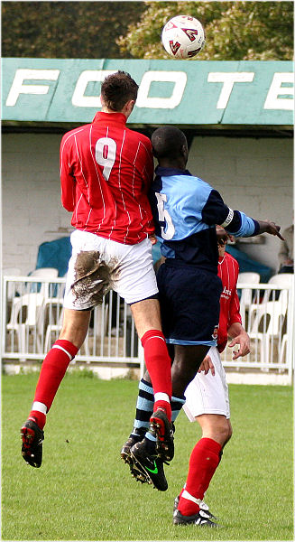Dave Walker (9) and Croydon captain Kwabena Amaning (5) compete
