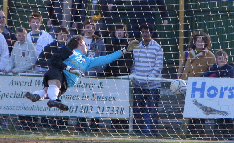 Lee Worgan is beaten by Lee Farrell's shot on 14 minutes
