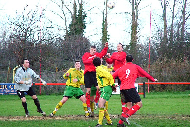 Danny Curd and Chris Morrow climb above the Westfield defence for this corner
