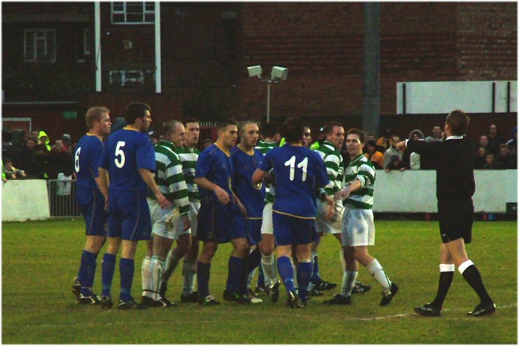 The referee tries to organise some singing
