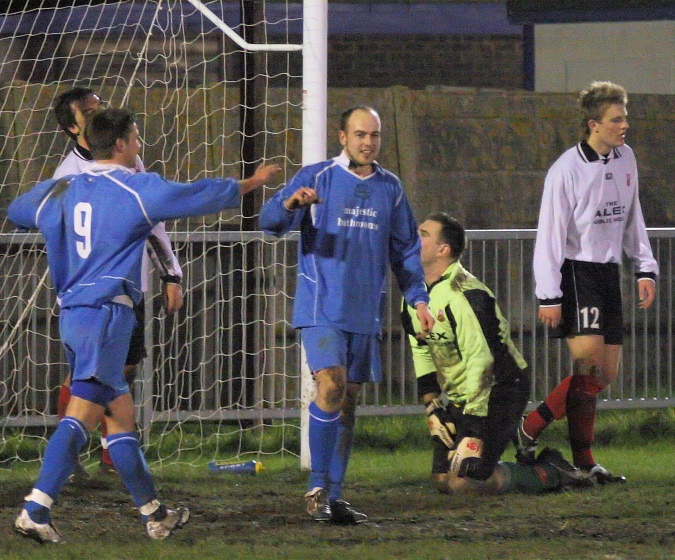 ... and Darren is congratulated by Owen Callaghan
