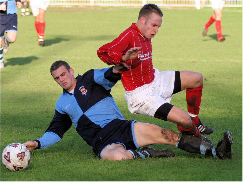 Stuart Read slides in on Matt Huckett
