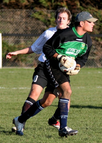 Matt May beats Josh Biggs to the ball
