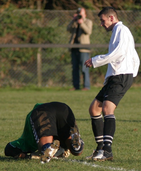 Matt May grabs the ball ahead of Phil Churchill
