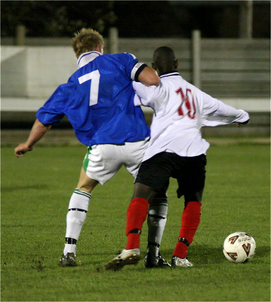 Alex Ward (7) tackles Jones Bamfo (10)
