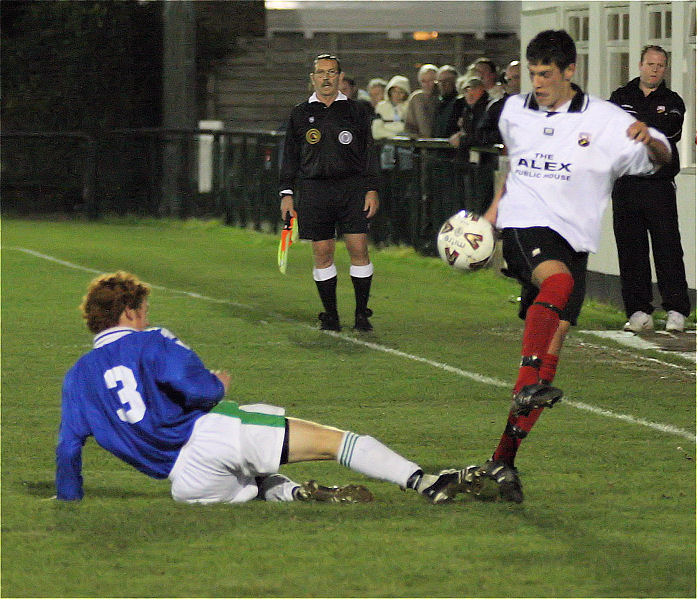 James Smith (3) tackles Michael Frangou
