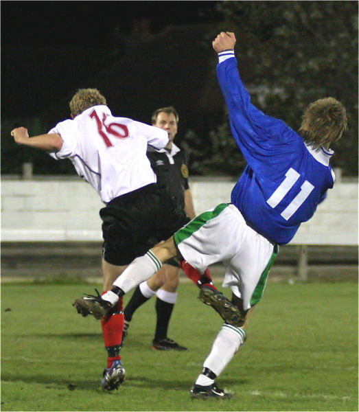 Calum Britton (16) and Adrian Brockway (11) off balance
