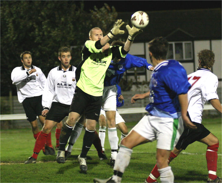 Pagham's Scott Hampton grabs the ball
