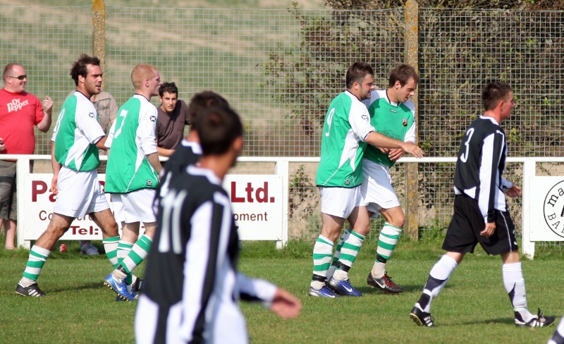 Rob Wimble is congratulated on opening the scoring for Pagham on 17 minutes
