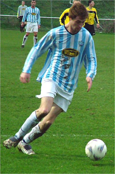 "Biff" Shelley lines up a shot on goal
