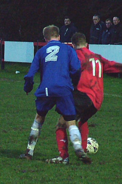 Nick Lansdale (2) tackles Danny Curd (11)
