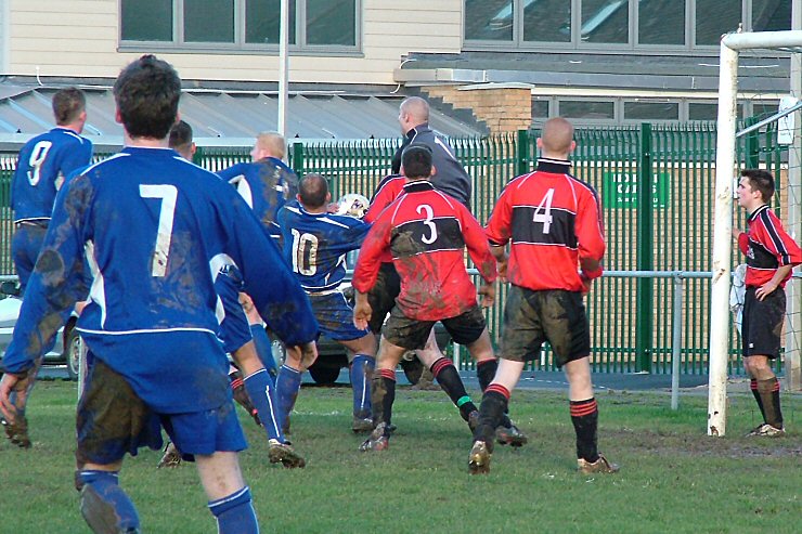 Russ Tomlinson (4), Steve Wood (10) and keeper Gary Newman compete for the ball with Andy Smart (9) Ryan Morten (7) Lloyd Hatton (3) and Rob Mills (4) backing up
