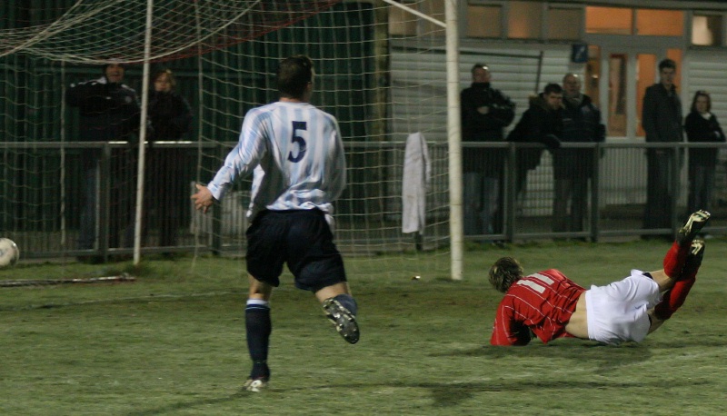 Mike Huckett takes a tumble but it's 2-0 to Arundel ...
