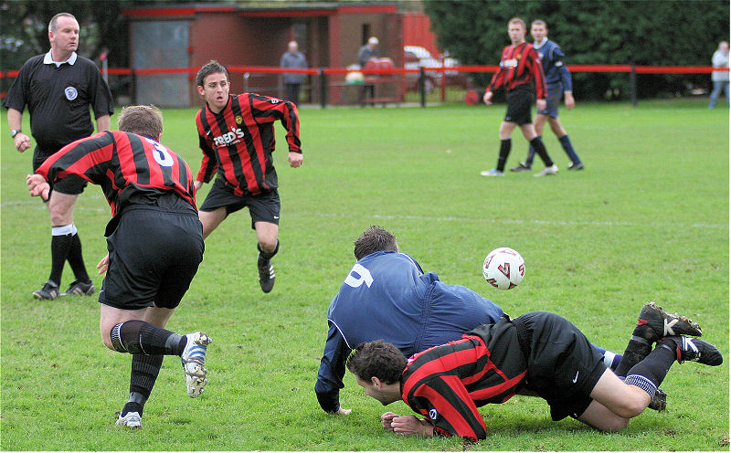 Dave Walker (9) and Olli Howcroft hit the deck with Lee Howard and Marc Cooper nearby
