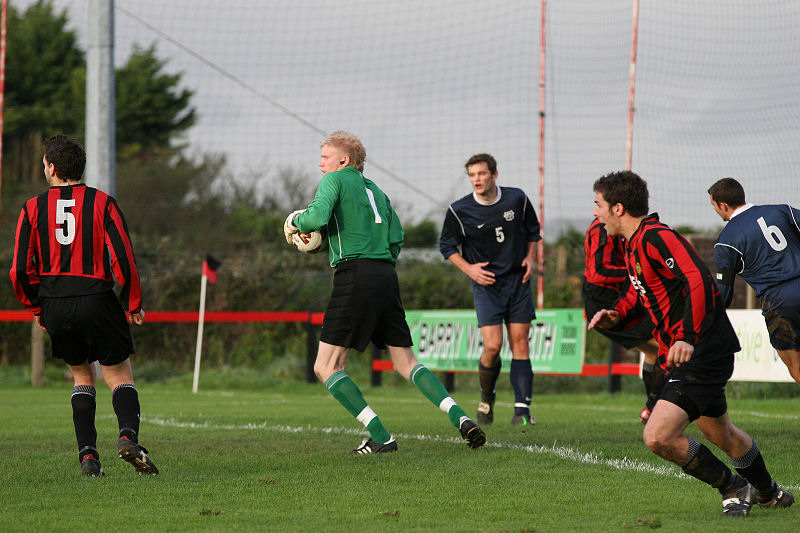 Tom Rand breaks up an Arundel attack
