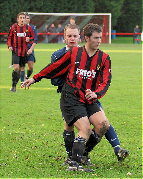 Tom Manton is tackled by Matt Huckett
