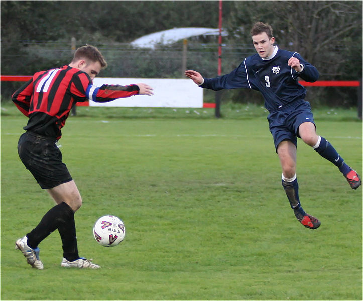 Danny Curd (11) takes on Chris Green (3)
