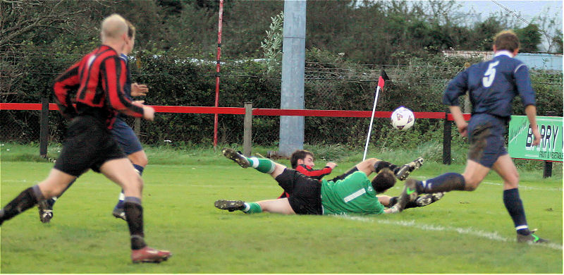 Arundel keeper Ben O'Connor stops Tom Manton
